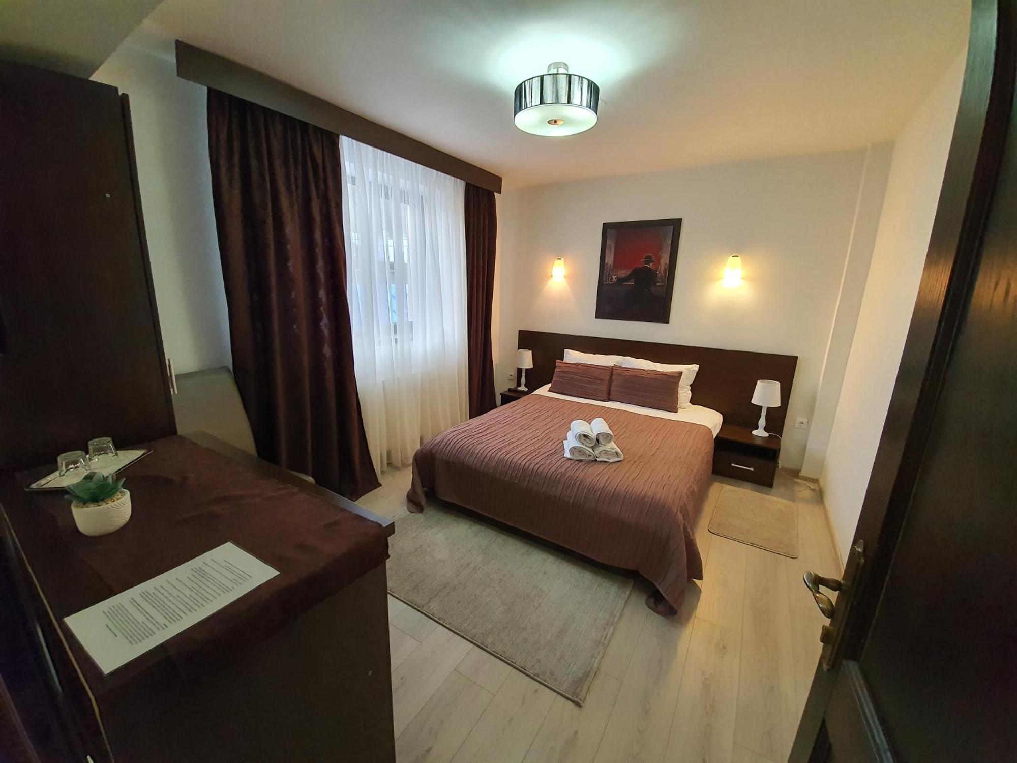 Pensiunea Public House Буштени Номер фото