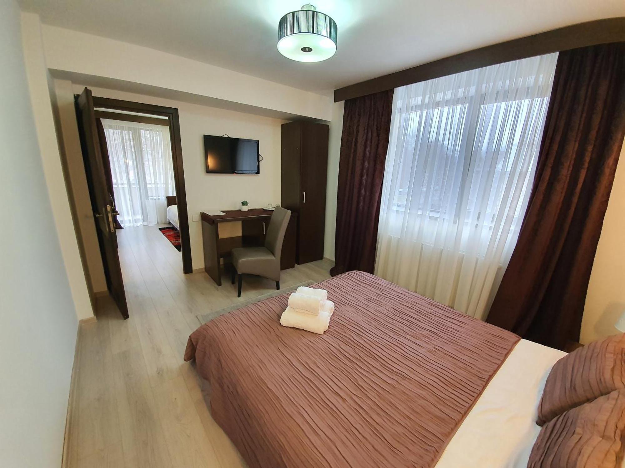 Pensiunea Public House Буштени Номер фото